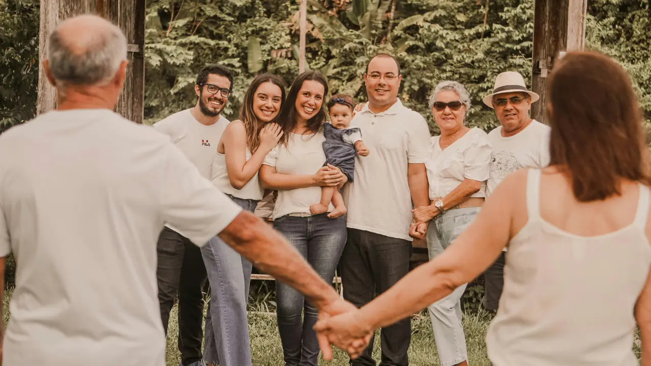 Family group hug showing love, compassion, and emotional support for a mesothelioma cancer patient during recovery.