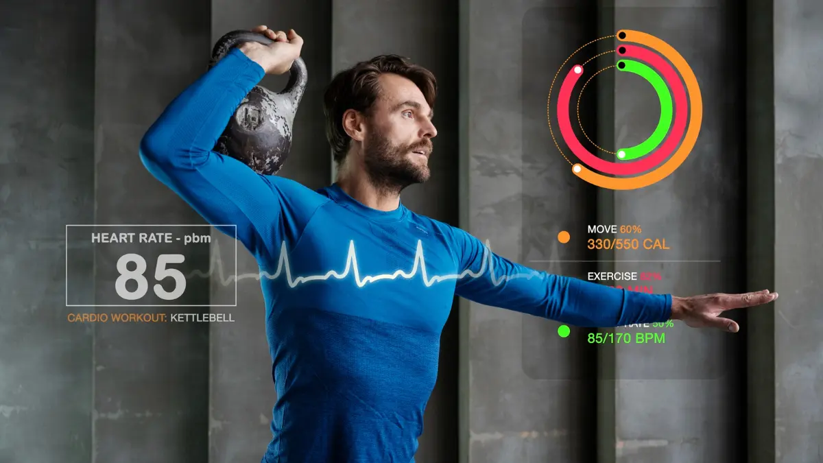 Man performing a kettlebell workout with digital activity and calorie burn metrics representing TDEE