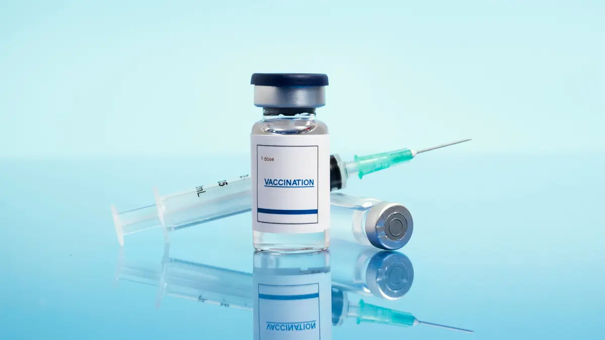 H3N2 Flu Vaccine, Tamiflu shown with vaccine vial and syringe representing reduced vaccine effectiveness and antiviral treatment importance