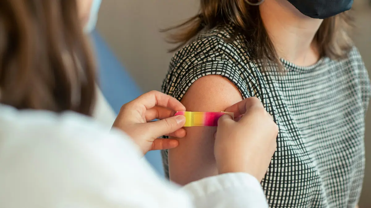 H3N2 Super Flu treatment - woman taking antiviral medication oseltamivir for H3N2 subclade K infection