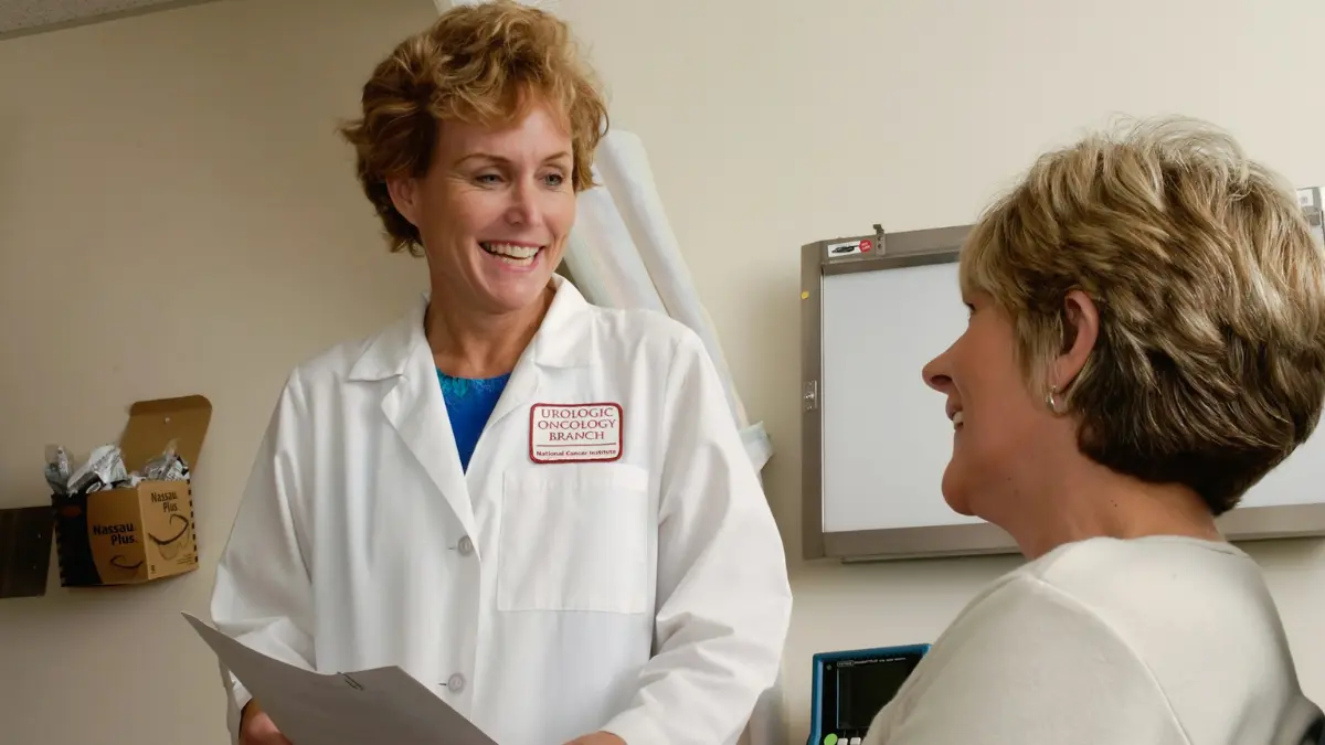 breast cancer survival rates oncology consultation between physician and patient discussing treatment and prognosis