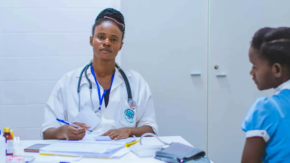 colonoscopy result doctor consulting with patient in a medical office