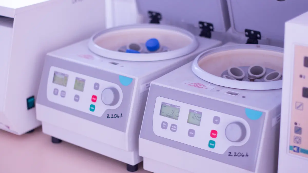 A functional laboratory machine separating blood components to help reduce anxiety when waiting for blood test results.