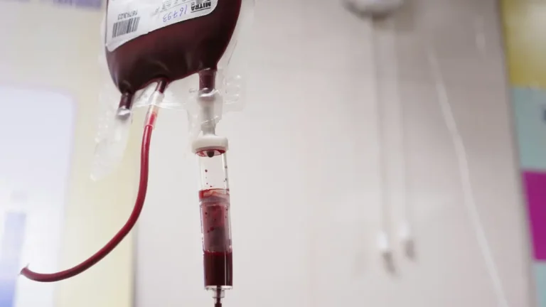 A close-up view of a medical sample collection tube and glass dropper being used to manage specimens while waiting for blood test results.
